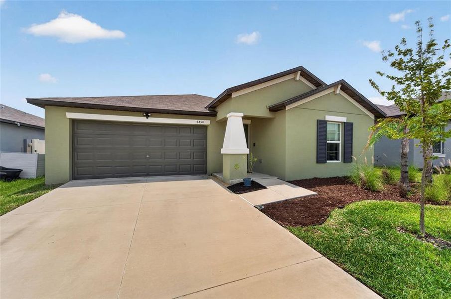Front exterior of a new home in , Bartow, FL, highlighting curb appeal (Image 28).