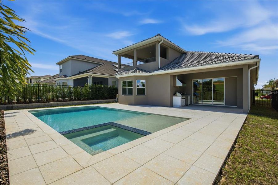 Exterior details and patio area of a home in Bella Collina, Montverde (Image 28).