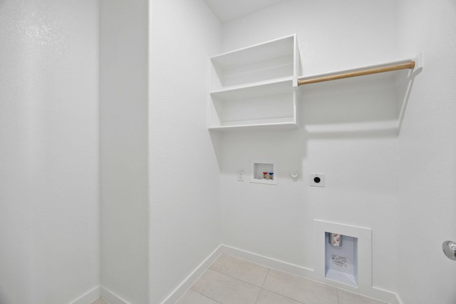 Utility Room in the Emmy II home plan by Trophy Signature Homes - REPRESENTATIVE PHOTO