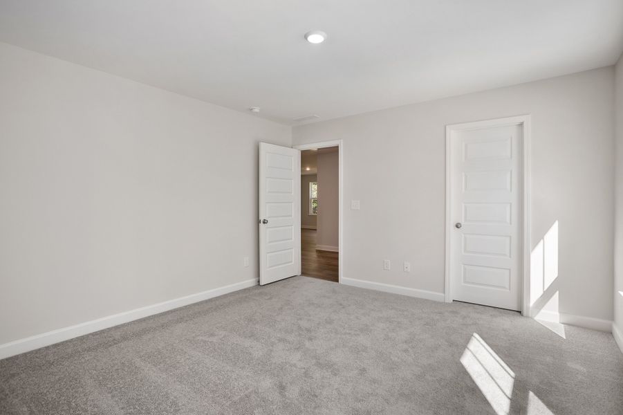 Spacious, unfurnished interior of a new home in Georgias Landing, Raleigh (Image 36).
