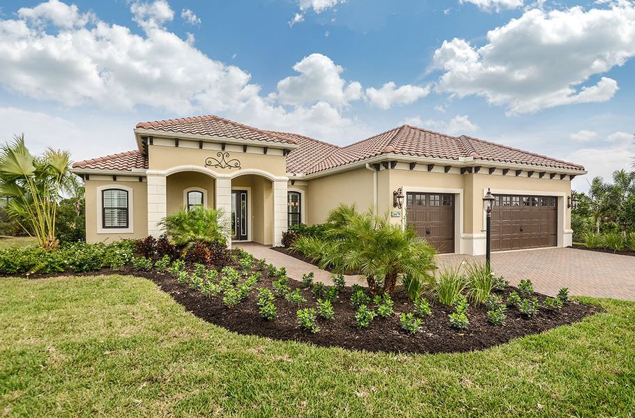 Representative exterior photo of a completed home built from the Sandcastle 2 by Neal Communities in Boca Royale Golf & Country Club at Wellen Park, Englewood, FL (Image 24).