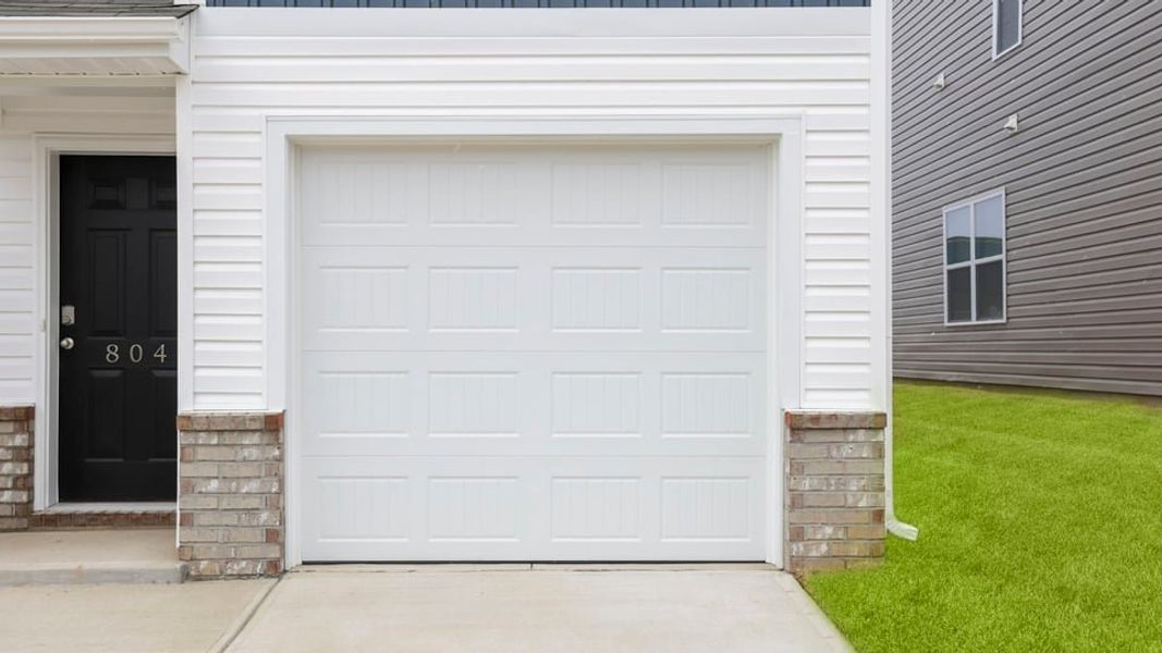 Exterior details and patio area of a home in Covington Village, Greer (Image 3).