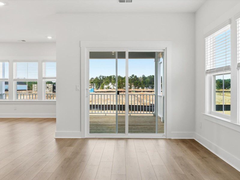 Spacious, unfurnished interior of a new home in The Coves at Lakes of Cane Bay, Summerville (Image 25).