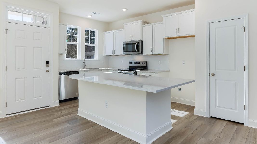 Furnished interior view inside a new home in Battle Bridge, Raleigh (Image 9).