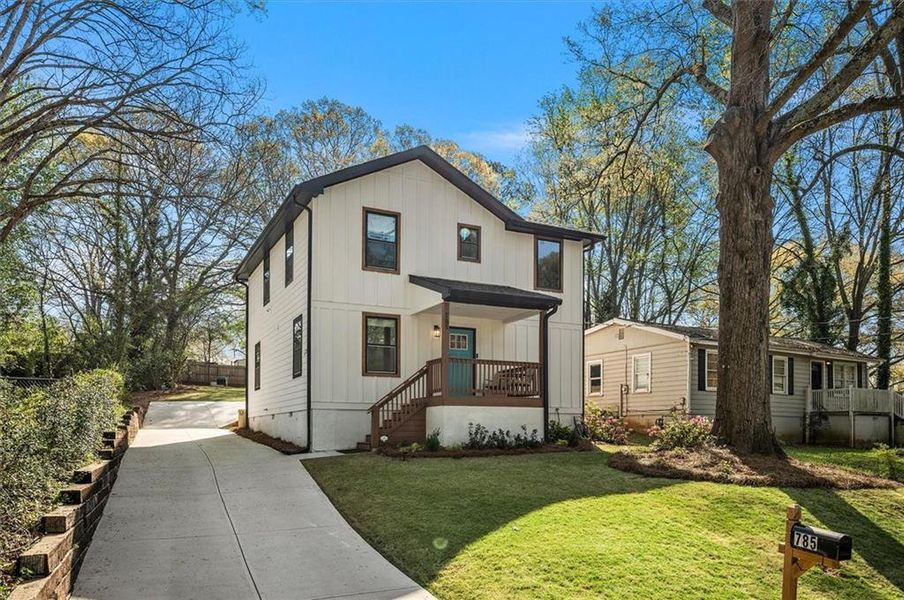 Front exterior of a new home in , Scottdale, GA, highlighting curb appeal (Image 24).