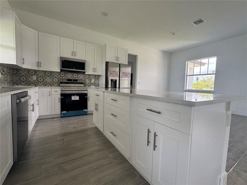Furnished interior view inside a new home in , Port Charlotte (Image 9).