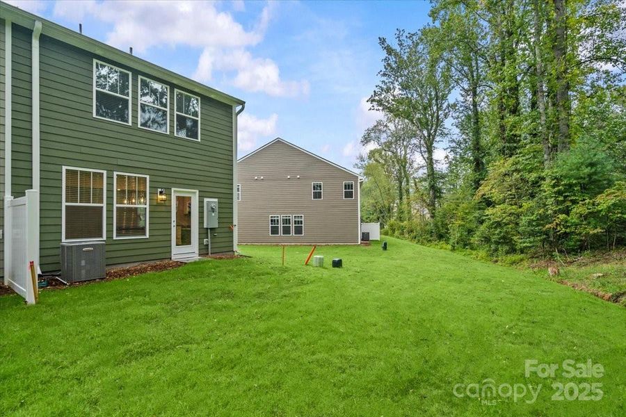 Exterior details and patio area of a home in Clayton Crossing, Arden (Image 3). Exterior details and patio area of a home in Clayton Crossing, Arden (Image 3).