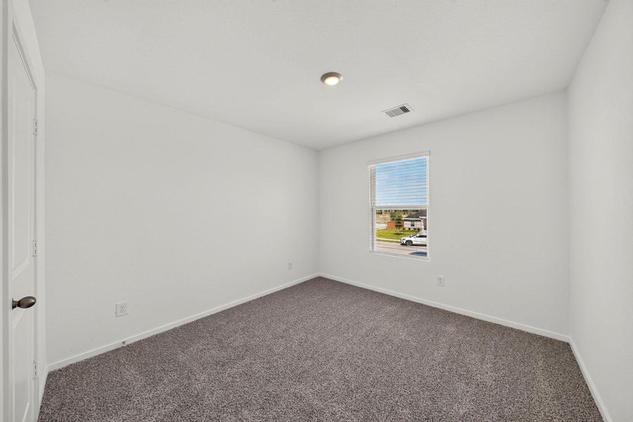 Spacious, unfurnished interior of a new home in Sunterra, Katy (Image 15).