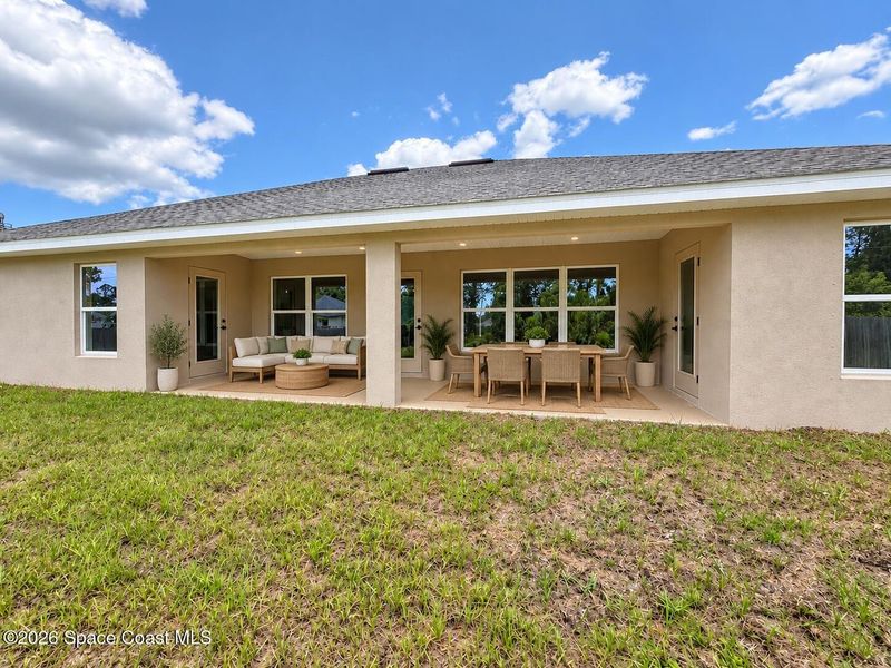 Exterior details and patio area of a home in Palm Bay, Palm Bay (Image 2). Exterior details and patio area of a home in Palm Bay, Palm Bay (Image 2).