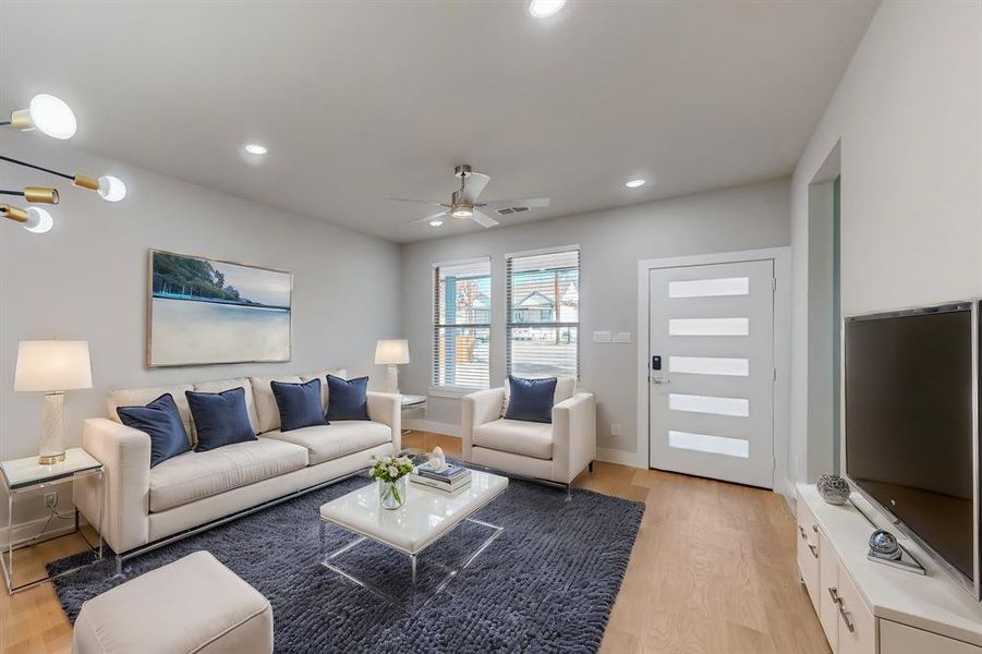 Virtua Staged Living room featuring light hardwood / wood-style flooring and ceiling fan