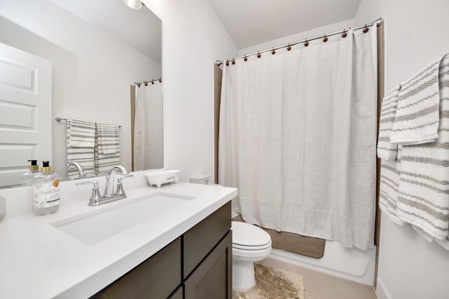 Furnished interior view inside a new home in Legacy Prairie at Katy Court, Katy (Image 38).