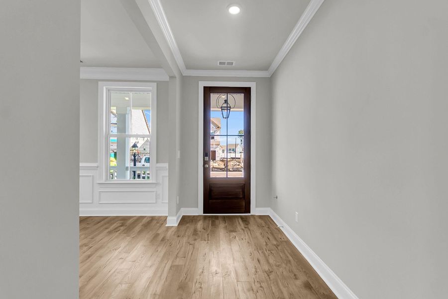 Spacious, unfurnished interior of a new home in Tidewater at Lakes of Cane Bay, Summerville (Image 14).