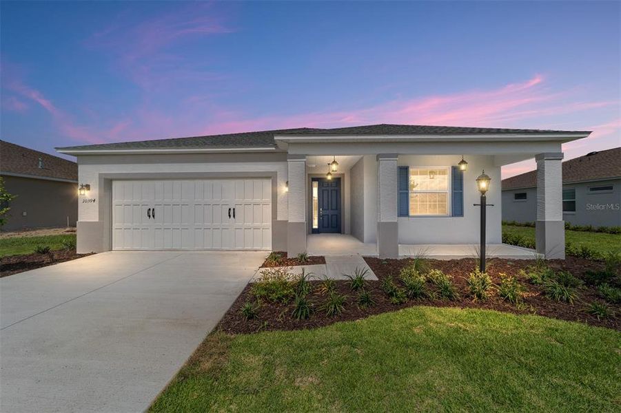 Front exterior of a new home in , Ocala, FL, highlighting curb appeal (Image 19). Front exterior of a new home in , Ocala, FL, highlighting curb appeal (Image 19).