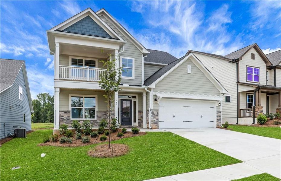 Front exterior of a new home in Twin Lakes, Hoschton, GA, highlighting curb appeal (Image 19). Front exterior of a new home in Twin Lakes, Hoschton, GA, highlighting curb appeal (Image 19).