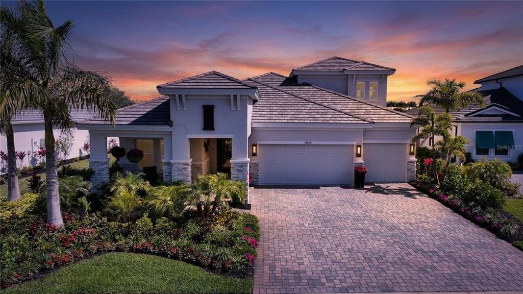 Front exterior of a new home in , Venice, FL, highlighting curb appeal (Image 21).