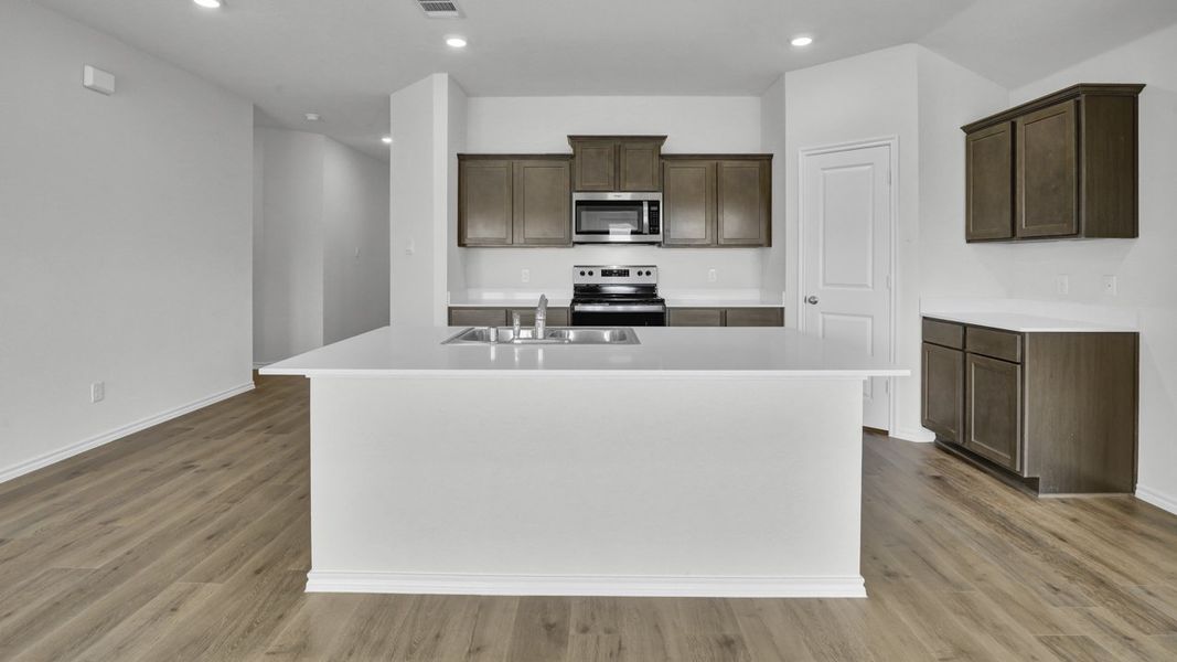 Furnished interior view inside a new home in Stonewyck Farms, Ennis (Image 6).
