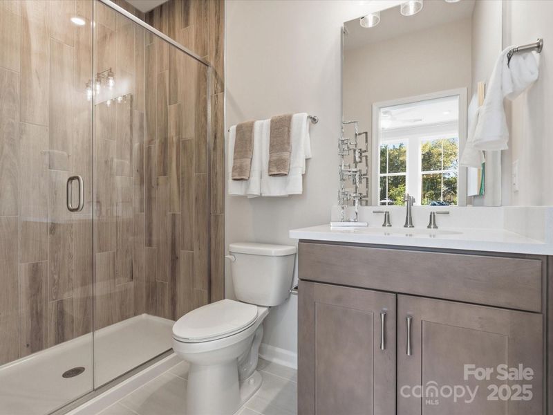 First Floor Full Bath. *Model Photos | Actual Finishes, Structural Selections, and Orientation May Vary.