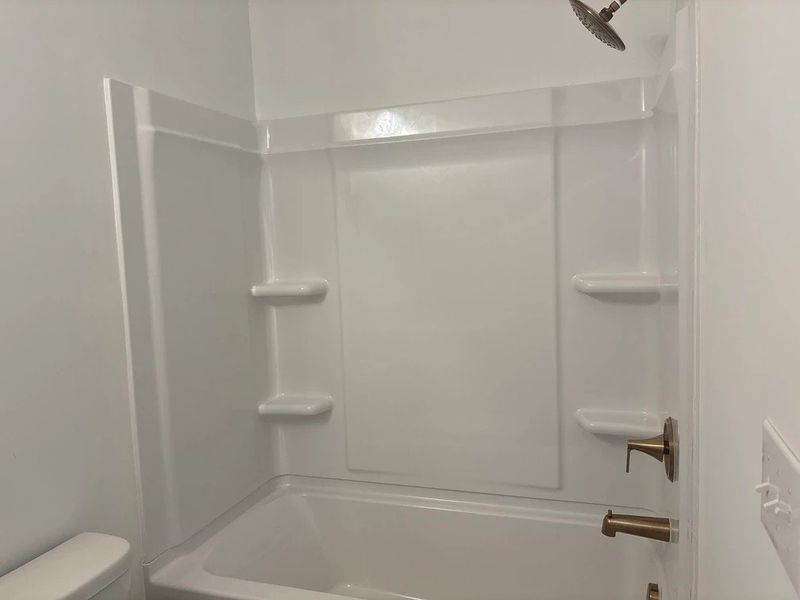 Bath 3 featuring the AW Collection® Serene - Earth-toned surfaces bring warmth and calm.