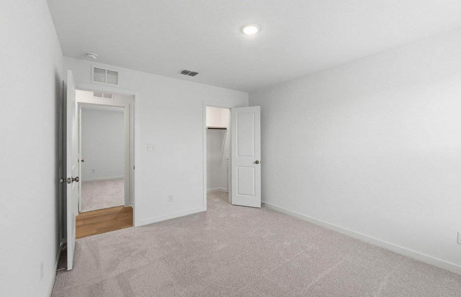 Spacious, unfurnished interior of a new home in Sunfield, Buda (Image 22). Spacious, unfurnished interior of a new home in Sunfield, Buda (Image 22).