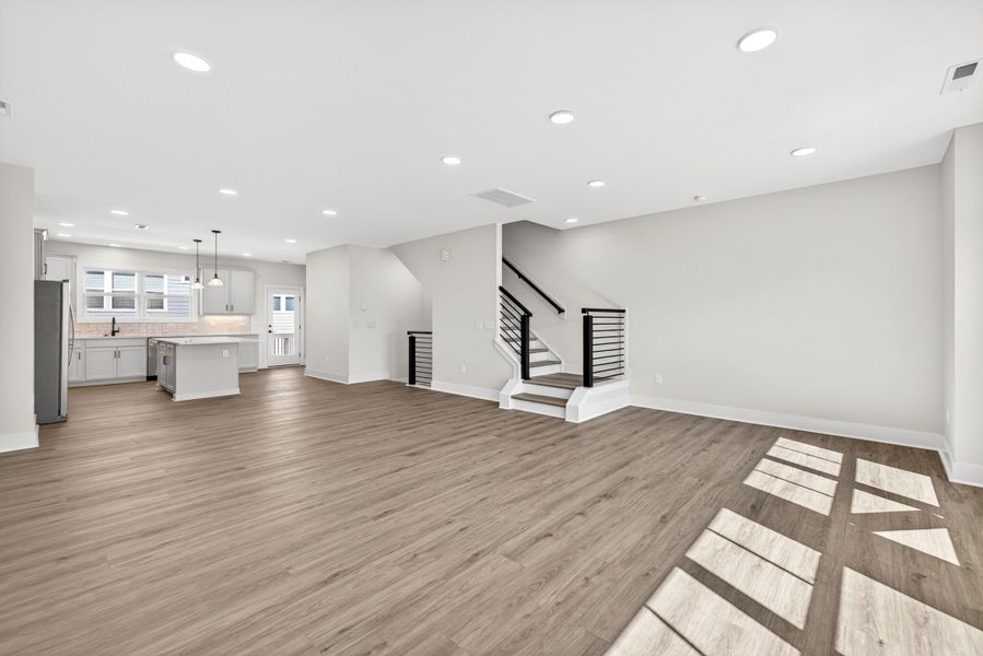 Representative unfurnished interior of a home built from the Atlas Interior Unit by Baker Residential in Atwater Station - Midtown Collection, Fuquay Varina (Image 24).