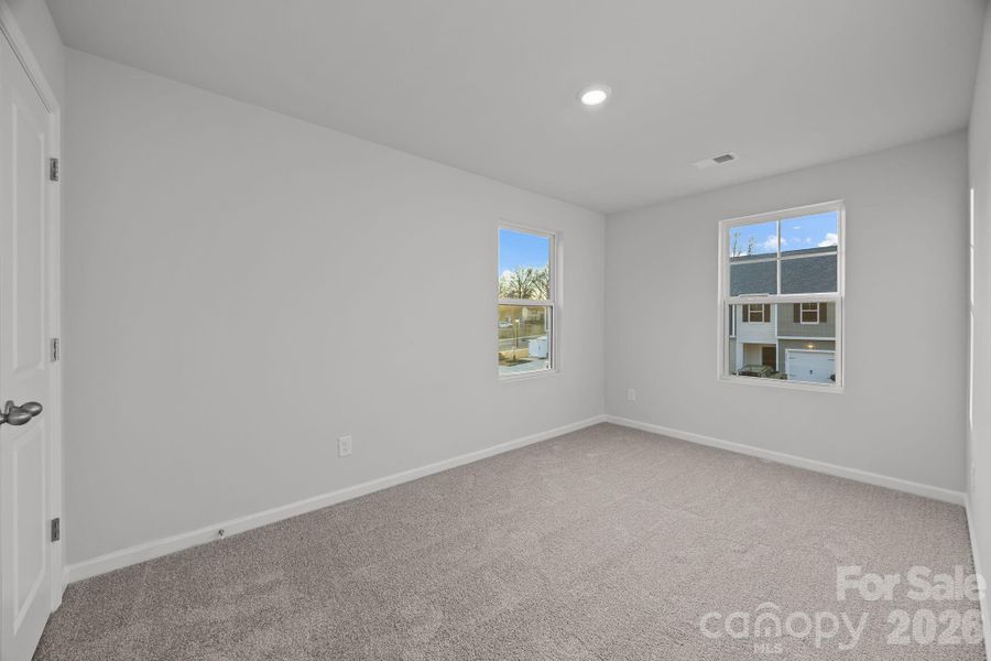 Spacious, unfurnished interior of a new home in Townes at Ribbon Walk, Charlotte (Image 11).