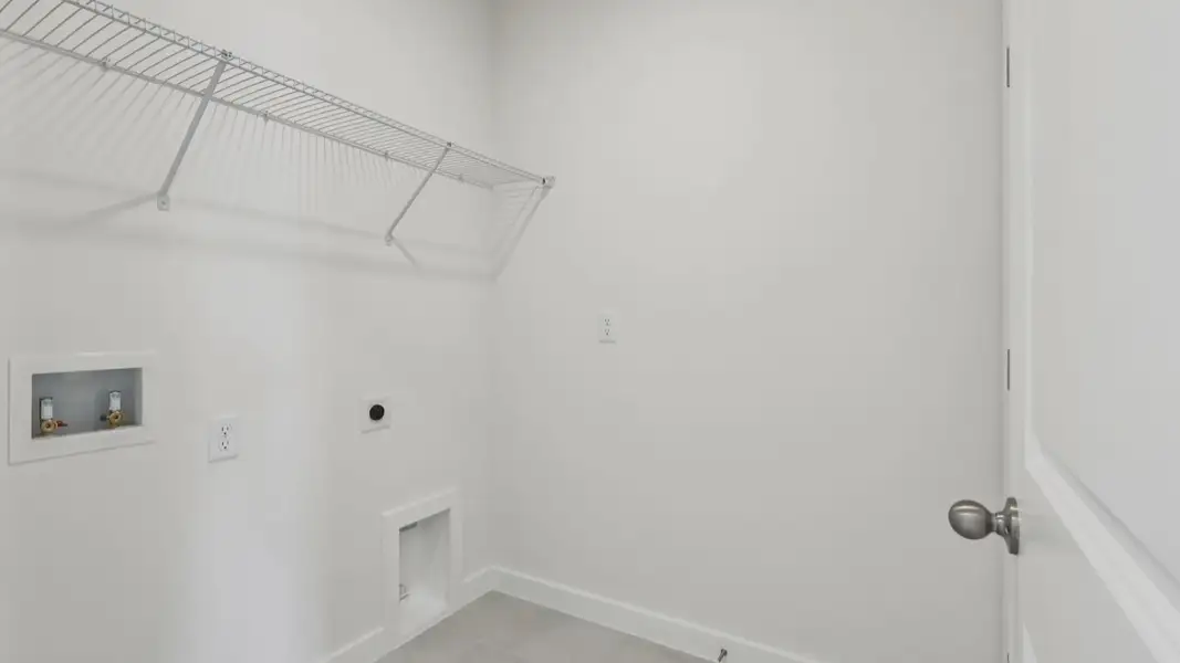 Furnished interior view inside a new home in Willowbrook North, Winter Haven (Image 18).