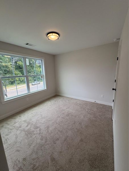 Spacious, unfurnished interior of a new home in Manor at Hall Creek, Arlington (Image 11).