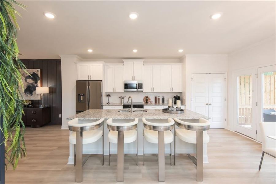 Furnished interior view inside a new home in Towns at Enclave, Lawrenceville (Image 10). Furnished interior view inside a new home in Towns at Enclave, Lawrenceville (Image 10).