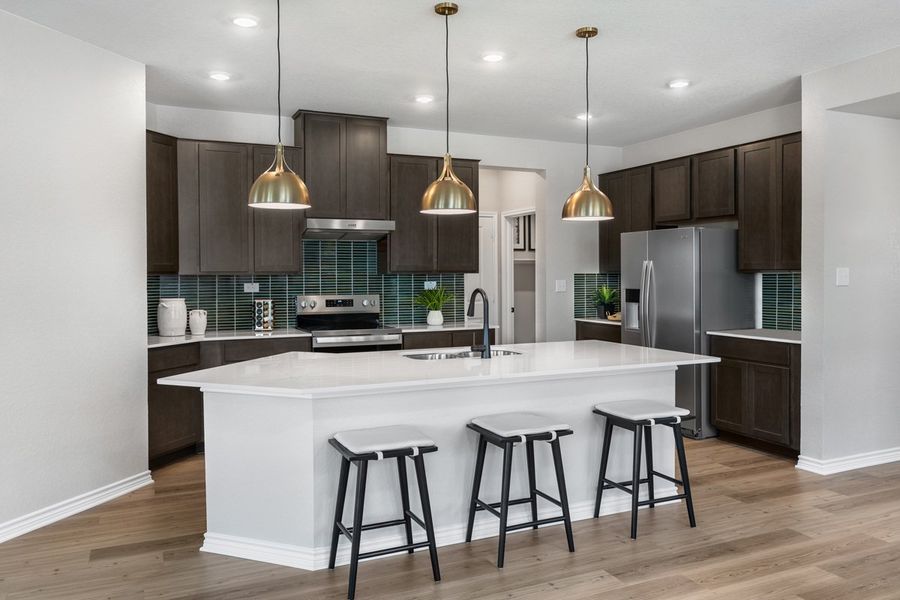 Representative furnished interior of a home built from the 2969 Modeled by KB Home in Legend Heights - Sterling Collection, New Braunfels (Image 9).