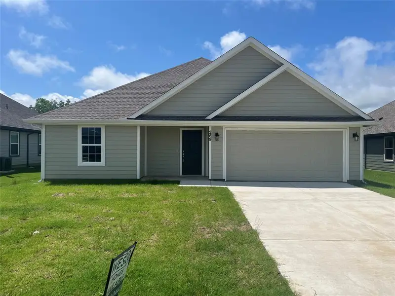 Front exterior of a new home in , Trenton, TX, highlighting curb appeal (Image 1). Front exterior of a new home in , Trenton, TX, highlighting curb appeal (Image 1).