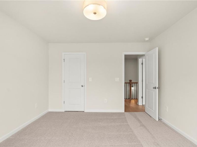 Spacious, unfurnished interior of a new home in The Village at Shallowford, Kennesaw (Image 32).