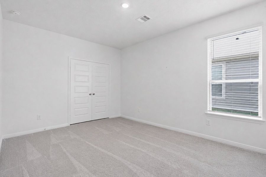 Spacious, unfurnished interior of a new home in Mustang Ridge, Magnolia (Image 21).