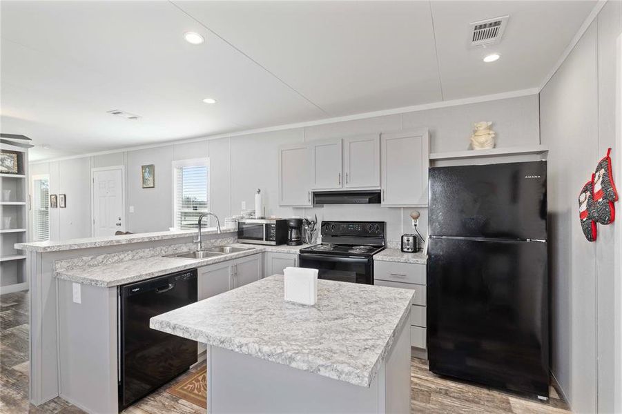 Furnished interior view inside a new home in , Brownwood (Image 7). Furnished interior view inside a new home in , Brownwood (Image 7).