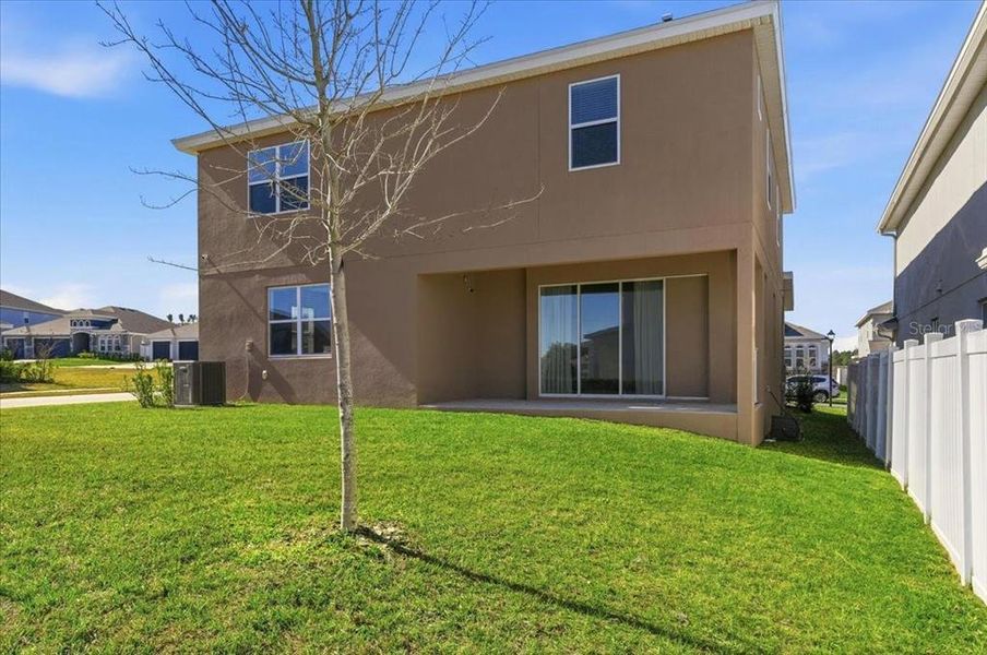 Exterior details and patio area of a home in Hills of Minneola, Minneola (Image 32).