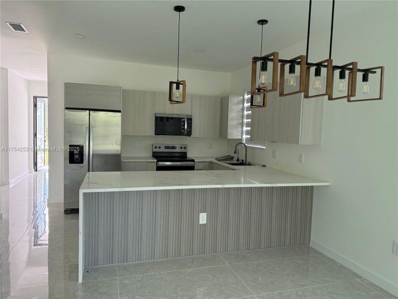 Furnished interior view inside a new home in , Punta Gorda (Image 37).