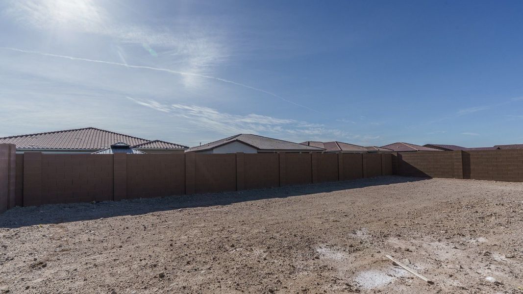 Exterior details and patio area of a home in Harmony at Montecito in Estrella, Goodyear (Image 22).