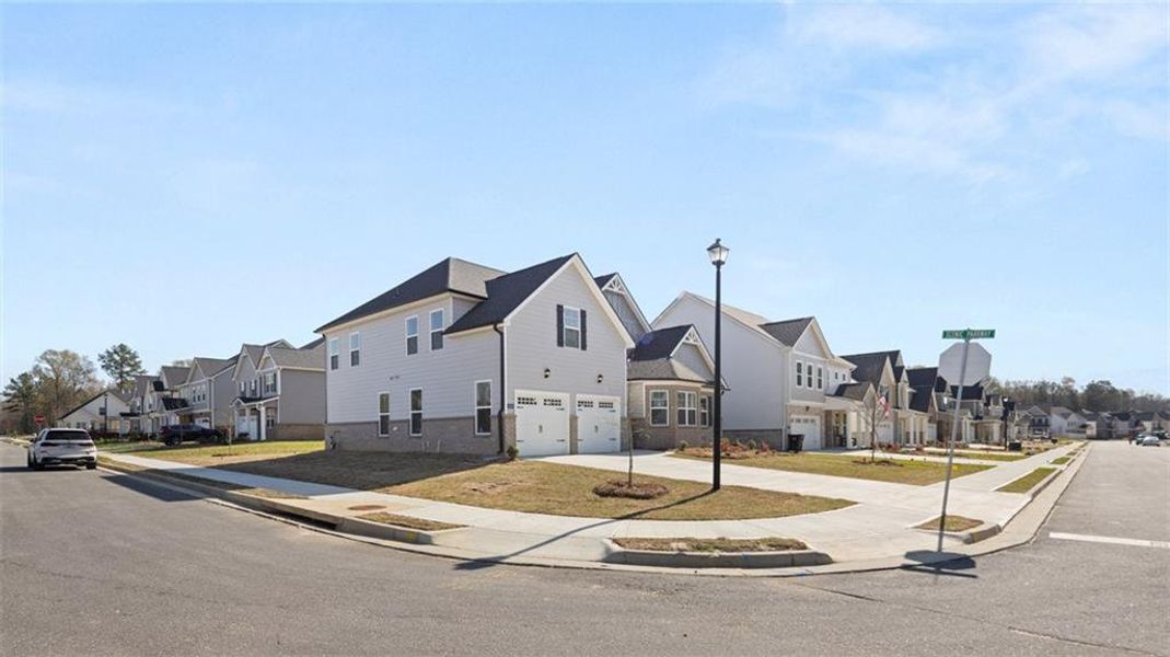 Front exterior of a new home in Wildwood, Covington, GA, highlighting curb appeal (Image 2).