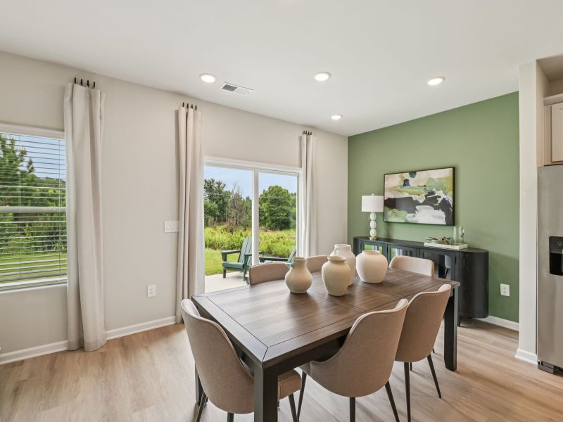 Dining area in the Chatham floorplan at a Meritage Homes community in Mebane, NC. Dining area in the Chatham floorplan at a Meritage Homes community in Mebane, NC.