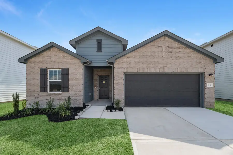 Front exterior of a new home in Royal Pines, Porter, TX, highlighting curb appeal (Image 1).