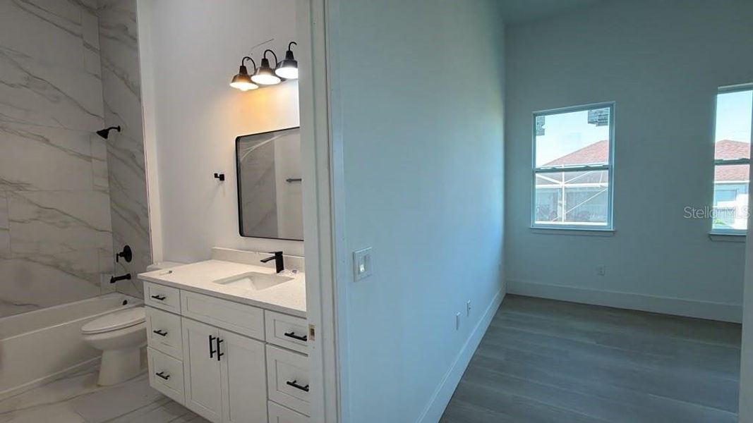Furnished interior view inside a new home in , Port Charlotte (Image 13).