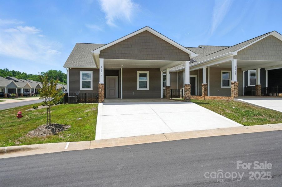 Front exterior of a new home in , Hickory, NC, highlighting curb appeal (Image 24).