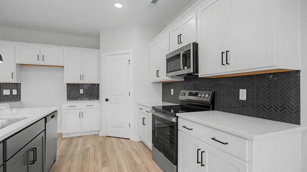 Representative furnished interior of a home built from the Greenwich by DRB Homes in McClure Farms, Columbia (Image 10). Representative furnished interior of a home built from the Greenwich by DRB Homes in McClure Farms, Columbia (Image 10).