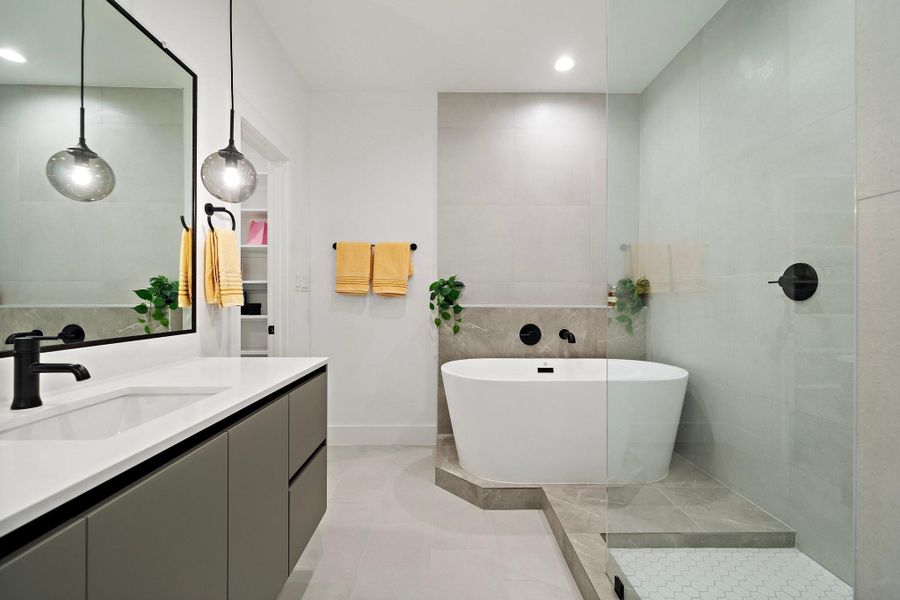 Experience ultimate relaxation in this stunning luxury spa-inspired bathroom, featuring a spacious central freestanding bathtub as its centerpiece. Experience ultimate relaxation in this stunning luxury spa-inspired bathroom, featuring a spacious central freestanding bathtub as its centerpiece.