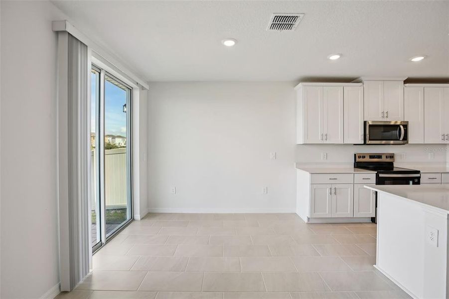 Furnished interior view inside a new home in Villamar - Signature Series, Winter Haven (Image 6).