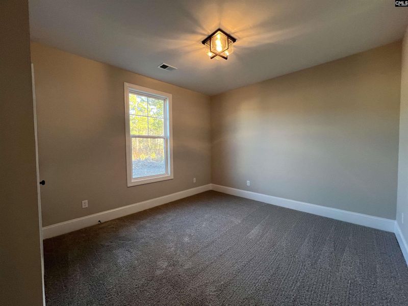 Spacious, unfurnished interior of a new home in The Cove, Sumter (Image 19).