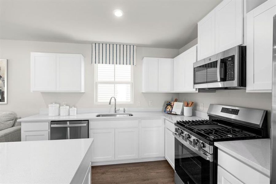 Representative furnished interior of a home built from the Ellis by Ryan Homes in Middle Creek Village Coastal Cottages & Villas, Bolivia (Image 7).