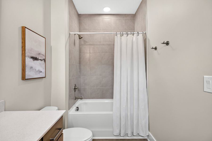 Representative furnished interior of a home built from the Weston End Unit by Baker Residential in Parc at Bradley Farm, Apex (Image 34).