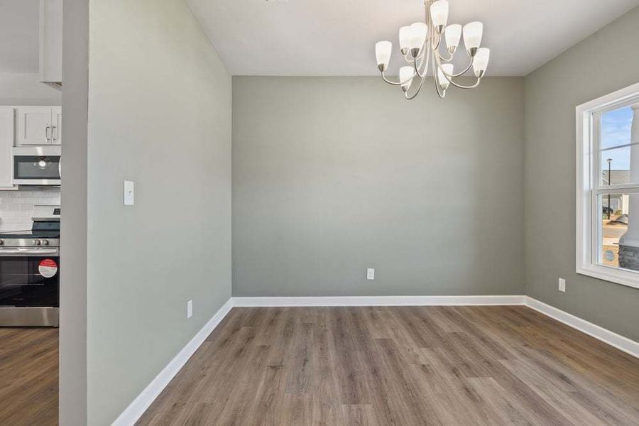 Representative unfurnished interior of a home built from the Camellia by Caviness & Cates Communities in Bartlett Manor, Youngsville (Image 37).