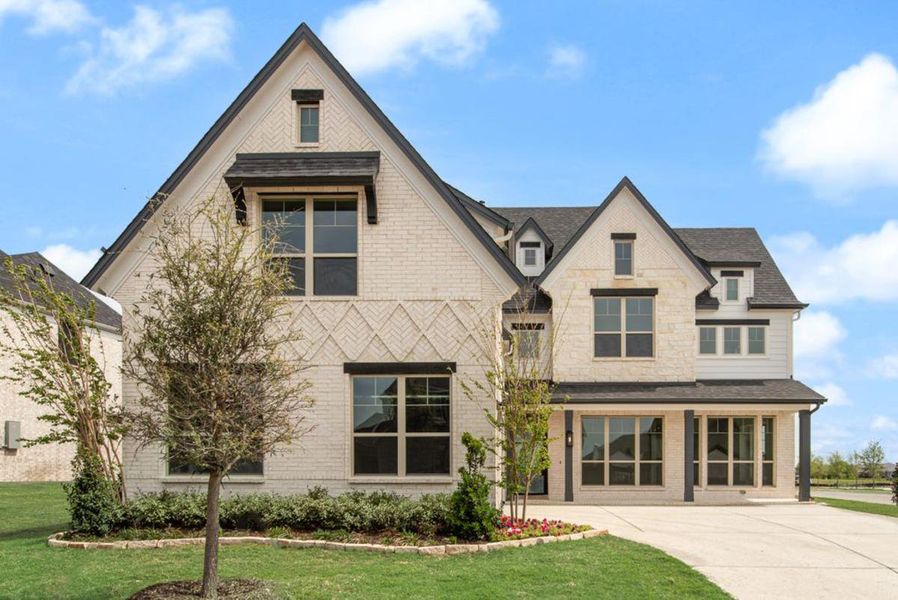 Front exterior of a new home in Park Place, Prosper, TX, highlighting curb appeal (Image 1). Front exterior of a new home in Park Place, Prosper, TX, highlighting curb appeal (Image 1).