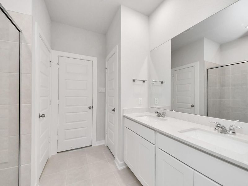 Furnished interior view inside a new home in Caney Creek Place, Conroe (Image 10).
